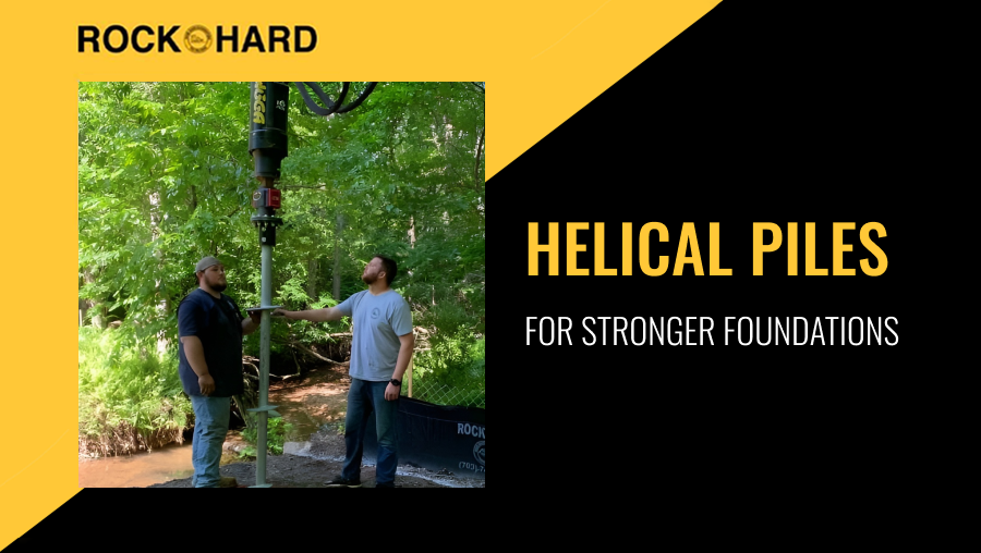 Worker installing helical pile at construction site